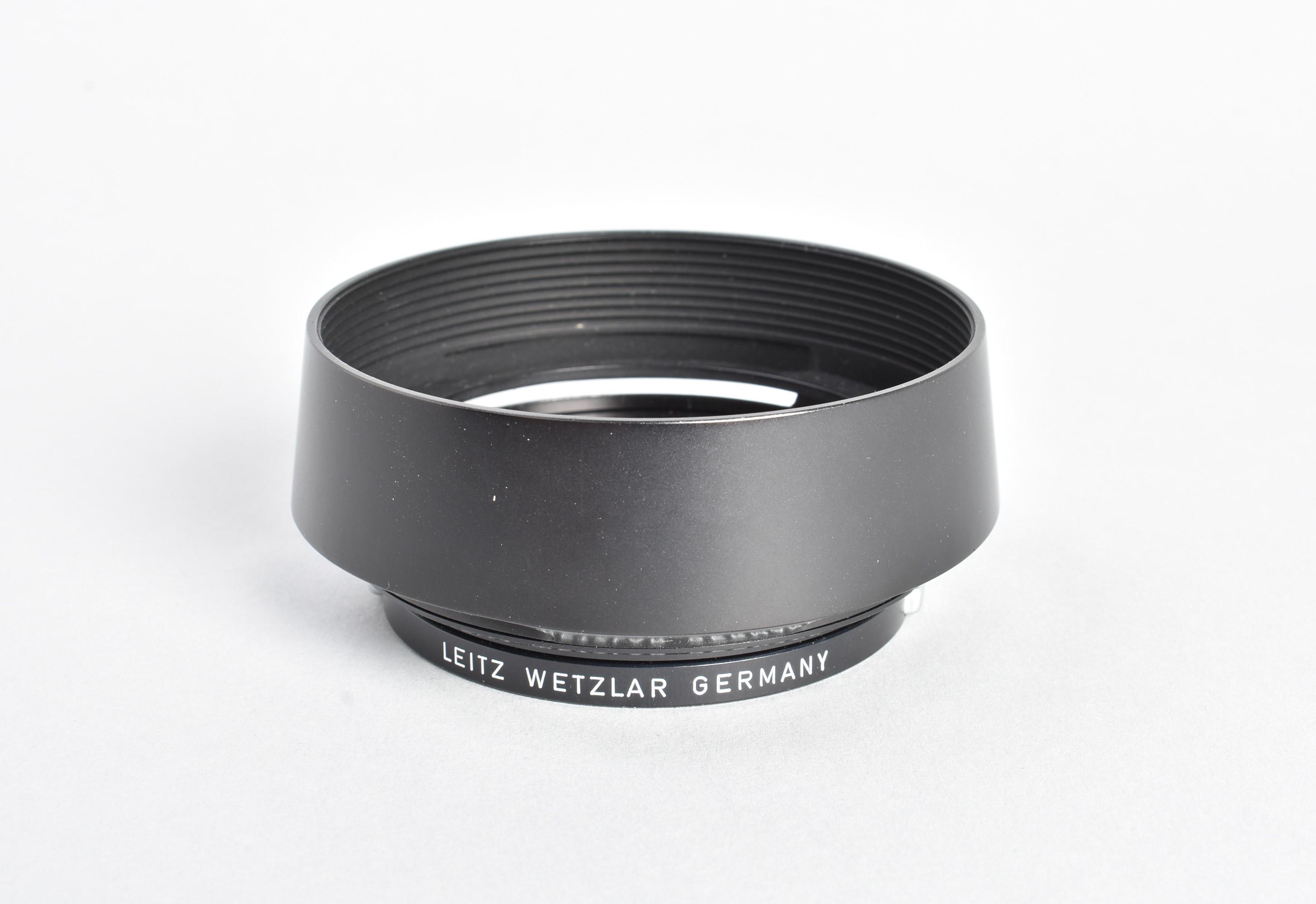 A rare Leitz Noctilux 50mm f/1.2 Lens Hood, serial no. 12503, incorrectly factory-engraved '1:1 2/