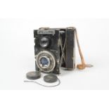 A Primarette Twin Lens Folding Camera, circa 1931-37, a taking camera topped by a second viewing
