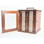 A 19th Century mahogany Microscope Slide Cabinet, twenty-one drawers, with glazed door, each