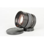 A Rollei HFT Carl Zeiss 85mm f/1.4 Planar Lens, QBM mount, serial no 6347613, barrel G-VG, slight