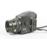 A Zenza Bronica ETRS Camera Outfit, serial no 7112729, shutter working, body G-VG, light marks to