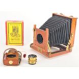 An early 20th Century mahogany and brass 3in x 4in Thornton-Pickard 'Tribune' Field Camera, with one
