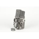 A Rolleiflex 2.8F K7F2 TLR Camera, serial no. 2 456 744, circa1966, 12/24 frame counter, body G,