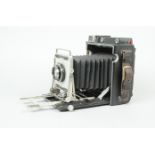 A Graflex Crown Graphic Special, serial no 932041, body G, slight wear to back, tripod mount,