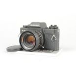 A Rolleiflex SL35 E SLR Camera, black, serial no 6512182, shutter working, meter responsive, body