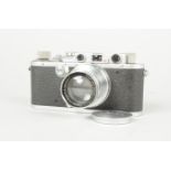 A Leitz Wetzlar Leica III Camera, serial no. 154 288, 1935, body F-G, shutter sticking, with a Leitz