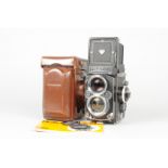 A Rolleiflex 2.8F TLR Camera, serial no 2457266, body VG, two smal dings to top of focusing hood,