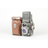 A Rolleiflex 2.8E K7E TLR Camera, serial no. 1 626 328, circa 1957, body G, dust to magnifier,