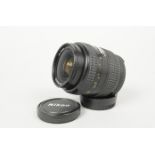 A Nikon AF Nikkor 28-70mm f/3.5-4.5D lens, AF working, barrel G-VG, slight wear, elements G,