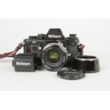 A Black Nikon F3 SLR Camera, serial no. 1 306 805, body G, shutter working, meter responds to