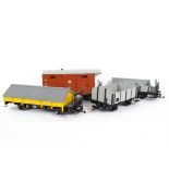 Unboxed G Scale Continental-style Freight Stock by LGB, five 4-wheeled open wagons in grey/black,