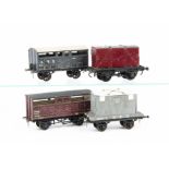 Bond's and Other O Gauge Wagons, an LMS cattle wagon and two flat wagons with containers, all