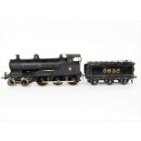 A Scratchbuilt 0 Gauge clockwork ex-LNWR 4-6-0 Locomotive and Tender, bearing some resemblance to