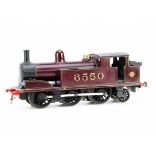 A (Believed-to-be) Bond's 0 Gauge 3-rail LMS 0-6-2 Tank Locomotive, a heavily-built model, appears