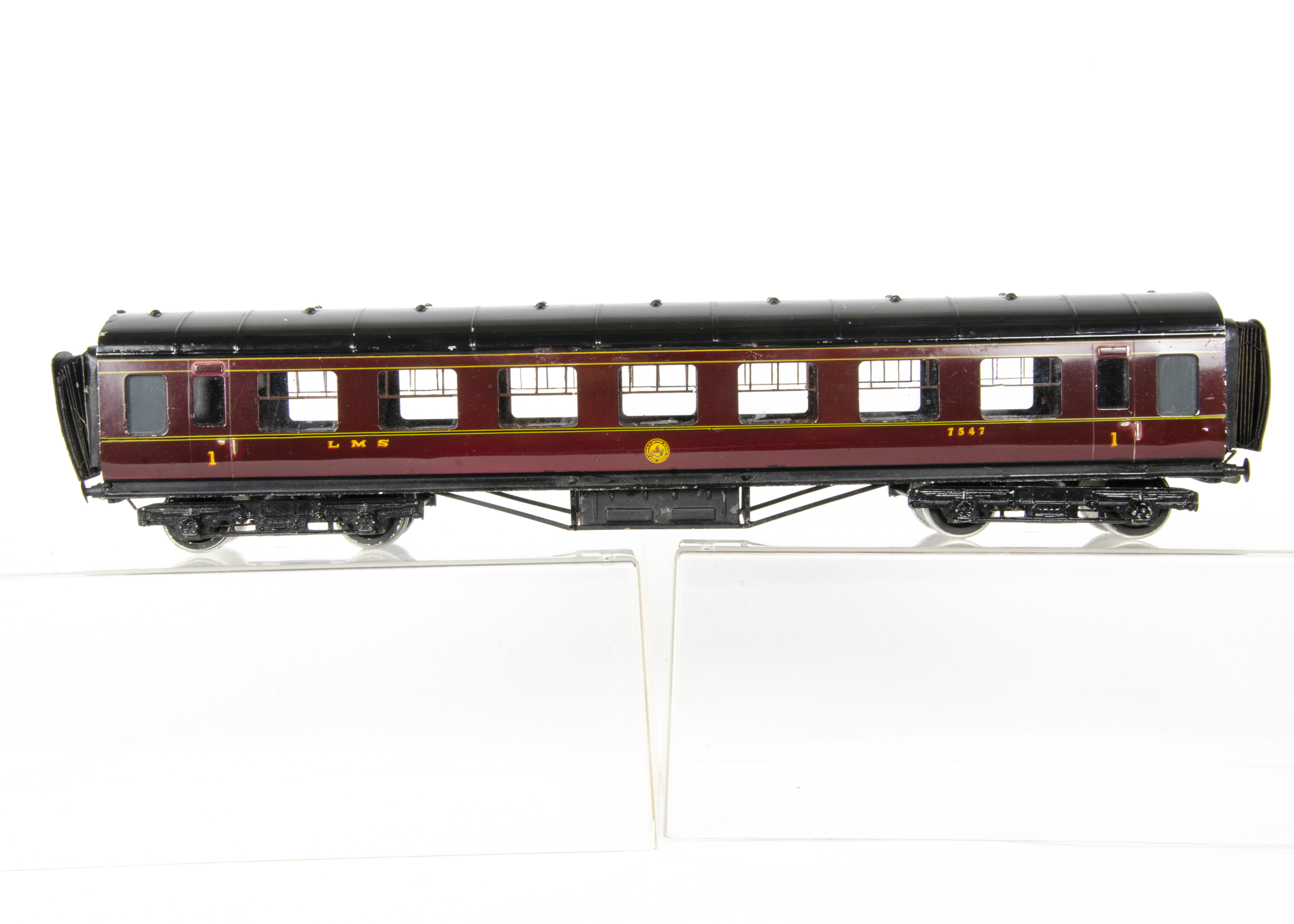 An Exley 0 Gauge K5 LMS Main Line 57' 1st Class Open Coach, in LMS crimson with transferred