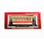 A Bachmann G Scale 'United Traction Co' Closed Electric Tramcar in red/ivory UTCo livery as no 1623,