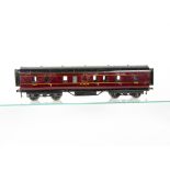 An Exley 0 Gauge LMS Main Line 50' Corridor Full Brake Coach, an older example in LMS crimson with