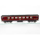 An Exley 0 Gauge LMS Main Line 57' 1st/3rd Class Composite Corridor Coach, in LMS crimson with