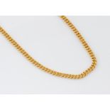 A continental flattened curb linked yellow metal necklace, the S shaped clasp marked 22, 51cm, 44g