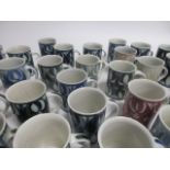 A collection of Aldermaston pottery cups, thirty two signed by Jenny Jowett and one by Alan Caiger-