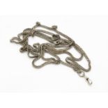 A George V silver multi curb linked muff chain, with snap clasp, 85cm long, weight 84g,