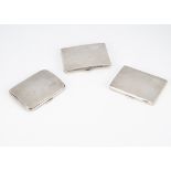 Three Art Deco period silver small cigarette cases, 6.5 ozt