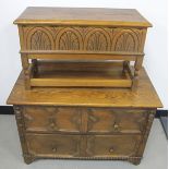 A 1920s oak two long drawer chest, with moulded decoration to drawer fronts and tear drop handles,