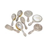 Eight Victorian and later silver dressing table items, all AF and damaged, three hand mirrors and