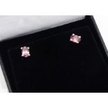 A pair of pink tourmaline stud earrings, oval mixed cut in claw setting, set in silver,