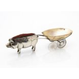 An Edwardian silver and shell novelty pin cushion and thimble holder, in the form of a pig pulling a