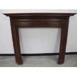 A 19th Century mahogany fire surround, with some later additions, 140cm x 26 cm x 130cm