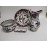 A 19th Century Imari pattern ironstone toilet set, consisting of a jug, height 33cm, large washbowl,