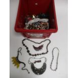A large quantity of costume jewellery, to include a necklace of ceramic beads with transfer