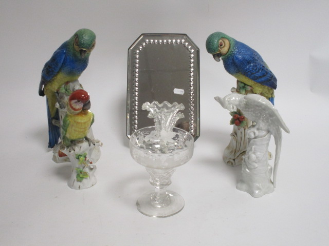 A small group of Continental glass and ceramics, including a pair of parrots, a blanc de chine