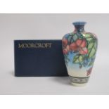 A contemporary Moorcroft vase, of high shouldered form, in the 'Bougainvillea' pattern designed by