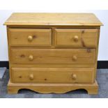 A small contemporary pine chest of drawers, two short over two long, 76cm x 40cm x 59cm