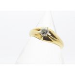 A gentleman's 18ct diamond set signet ring, the brilliant cut diamond in claw setting on a yellow