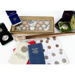 A collection of coins and a swagger stick, including several British crowns, a 2016 Royal Marines