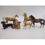 A small collection of horses and dogs, mostly Beswick, the tallest 17cm, one horse a/f