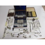 A set of six 1950s silver teaspoons, Sheffield 1953, together with a set of six silver plated fish