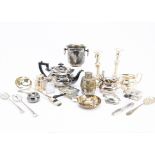 A collection of silver plated items, including a Sheffield plate pair of candlesticks, three piece