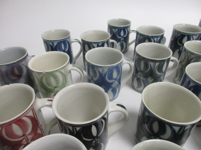 A collection of Aldermaston pottery cups, thirty two signed by Jenny Jowett and one by Alan Caiger- - Image 5 of 7