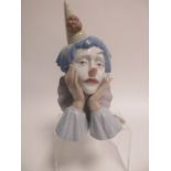 A Lladro 'Clown Head' bust, no.5129, height 32 cm, AF in the original box