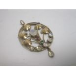 An early 20th Century yellow metal moonstone and gem set oval pierced pendant, with stylised tulip