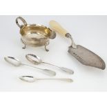 Five items of George III silver, including a fish slice with carved ivory handle, a sauceboat and