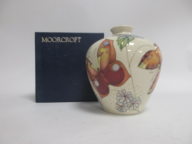 A contemporary Moorcroft pottery vase, of bulbous form, in the 'Butterfly' pattern designed by