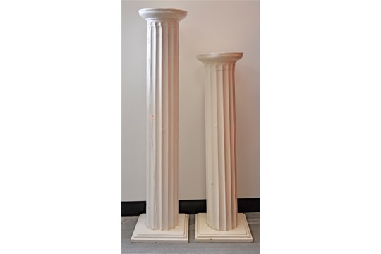 Two 20th Century hardwood plinths, modelled as Roman columns with square bases, painted white,