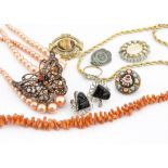 A quantity of costume jewellery, including simulated beads, silver screw back earrings, a nursery