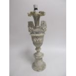 A 20th Century marble lamp base, modelled as a twin-handled urn with fluted edges upon a circular