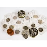 A large collection of modern British crowns, together with a jar of half pennies, a tin of